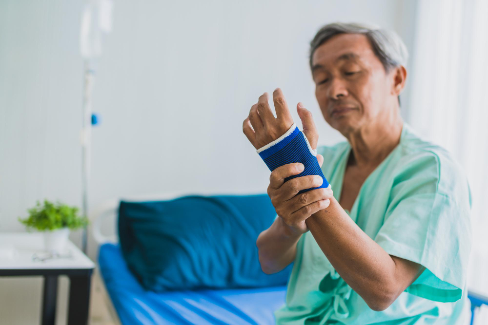 pain wrist pain senior asian grandfather patient uniform suffer from body problem health ideas concept